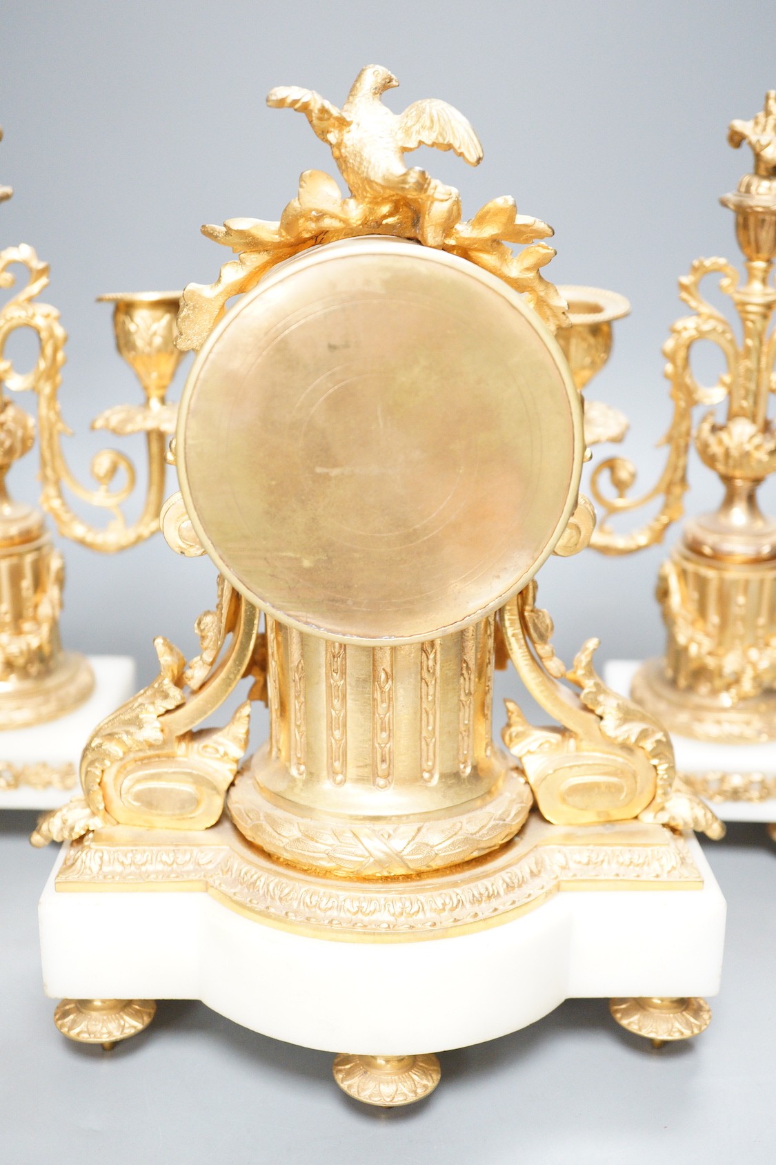 A French ormolu and alabaster clock garniture, 27cm